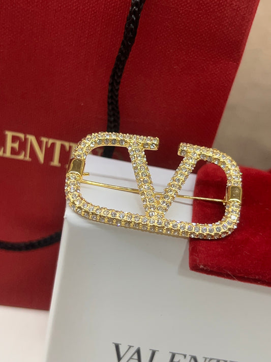 Prendedor Valentino Clasico