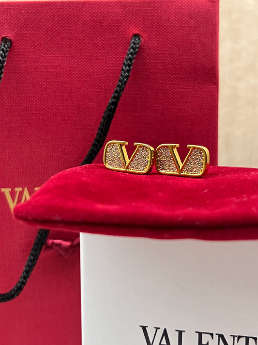 Aretes Valentino Logo Envuelto En Zirconia