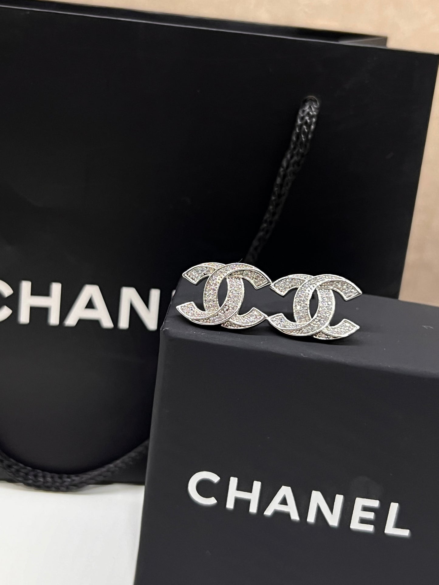 Arete Chanel Curveado
