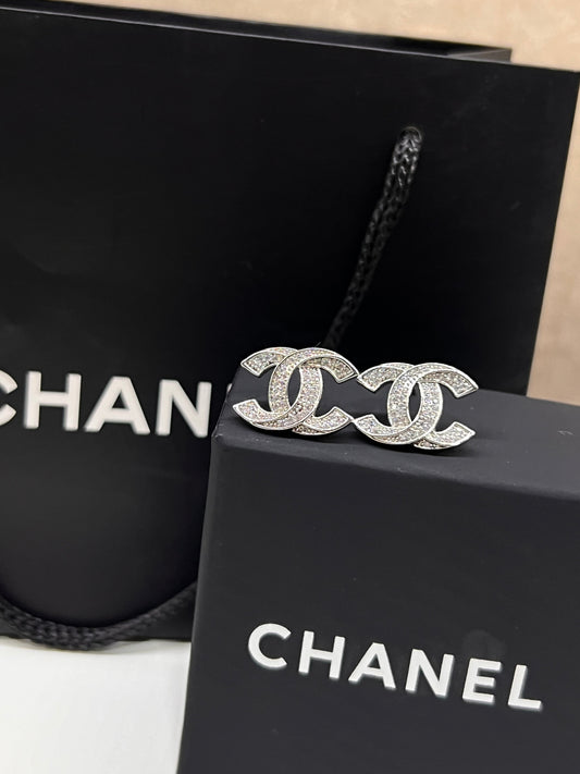 Arete Chanel Curveado