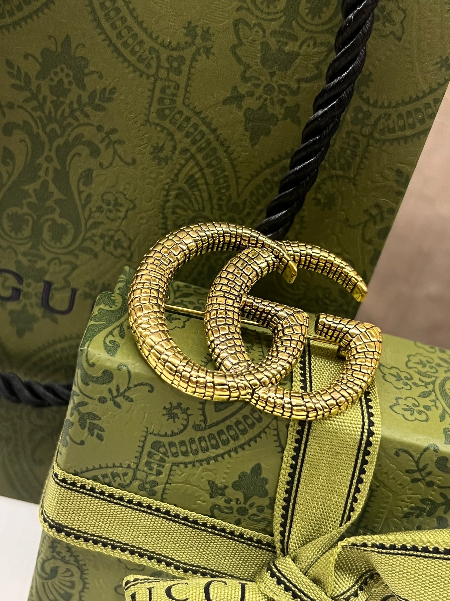 Prendedor Gucci Serpenti