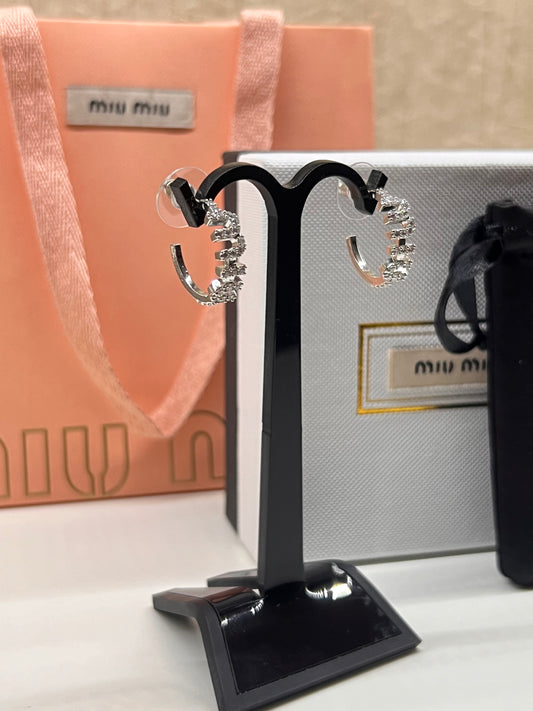 Arracadas Miu Miu Clasicas