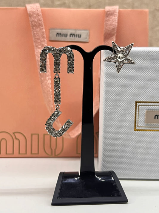 Aretes Miu Miu Asimetricos Estrella
