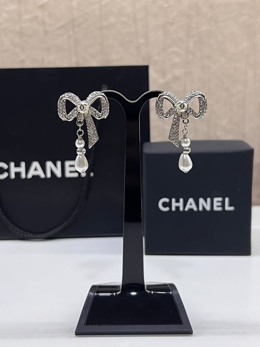 Aretes Chanel Moño Colgantes