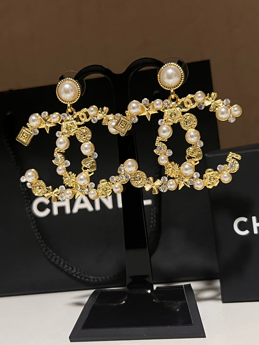 Aretes Chanel Logo Xl Elegancia