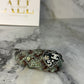 broche chanel para cabello en tela