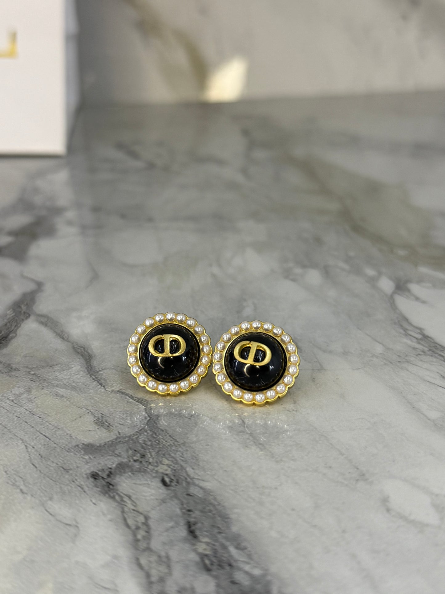 arete Dior negro c/perlas