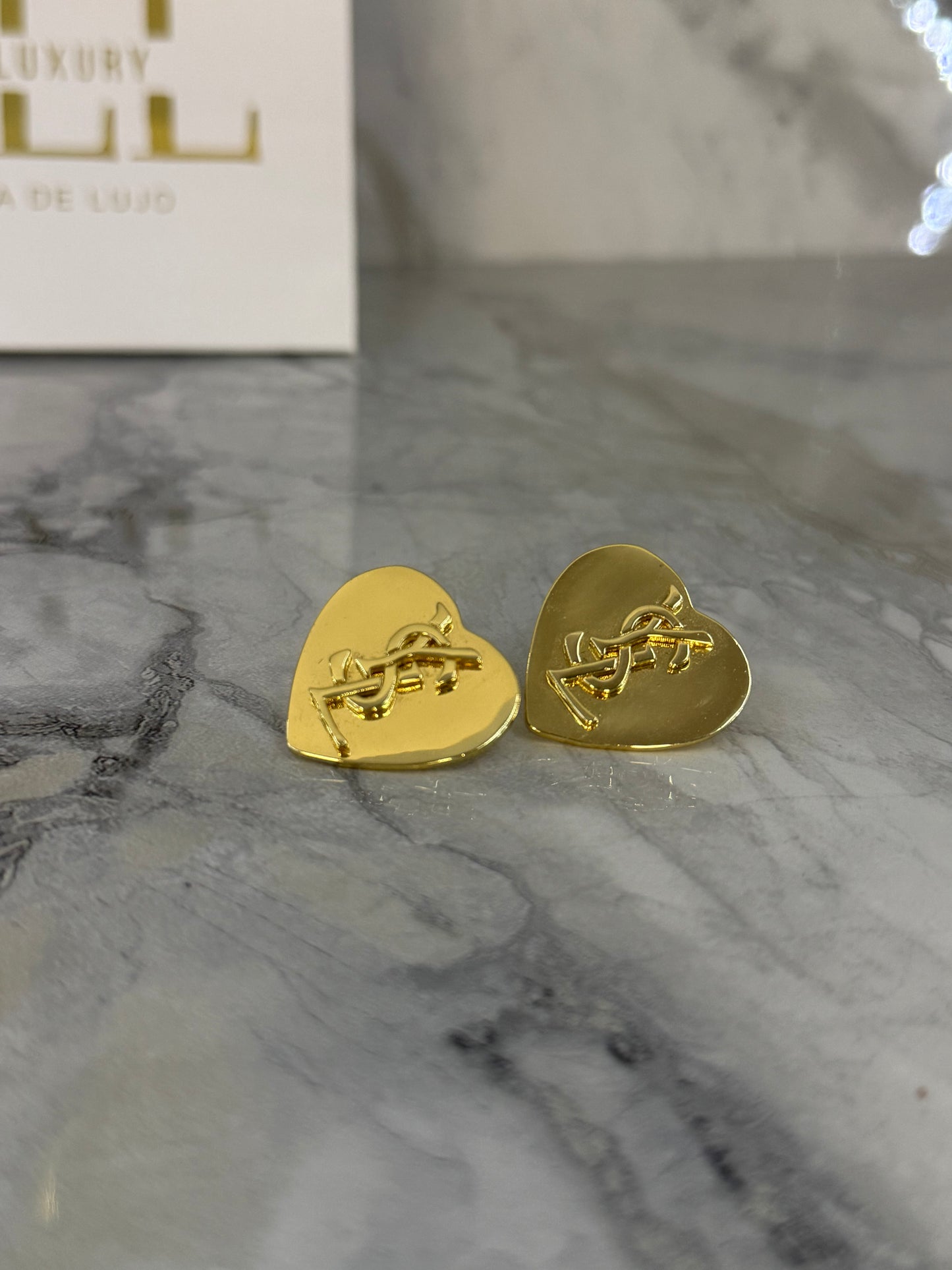 aretes ysl corazon oro