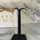 aretes ysl cadena