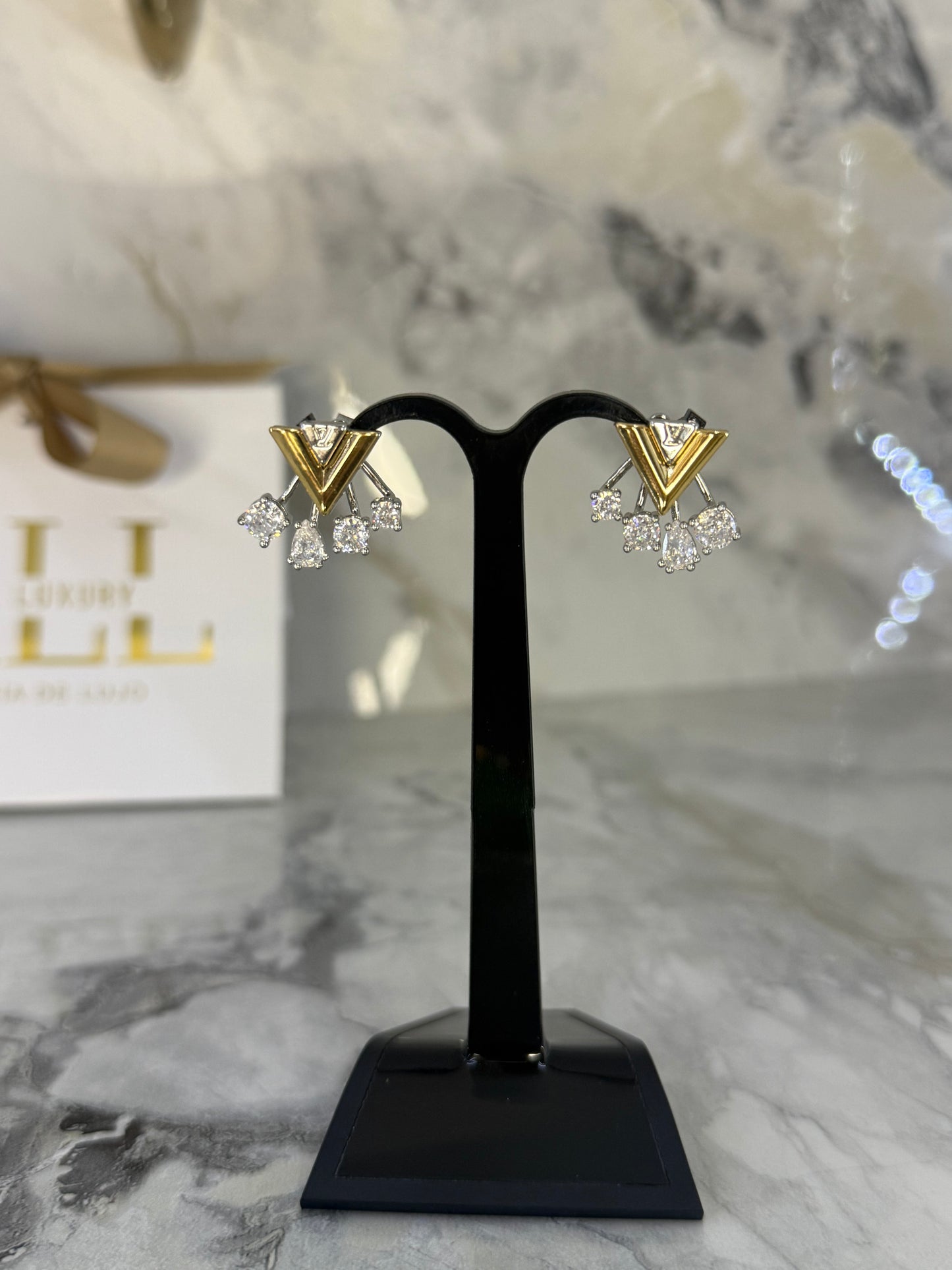 aretes LV doble vista