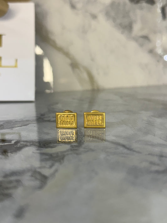 aretes placa miu miu